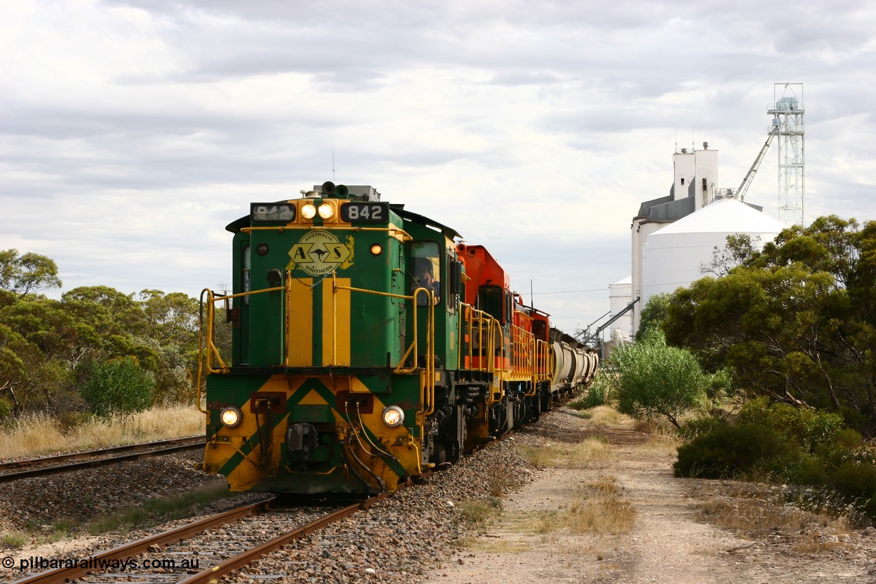 060108 2067
Lock, grain train being loaded by former SAR 830 class unit 842, built by AE Goodwin ALCo model DL531 serial 84140 in 1962, originally on broad gauge, transferred to Eyre Peninsula in October 1987 and, 1204 and sister 851.
Keywords: 830-class;842;84140;AE-Goodwin;ALCo;DL531;