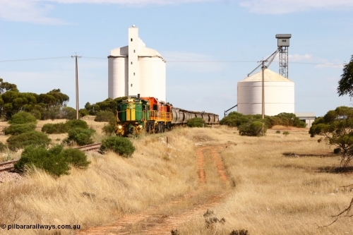 060109 2119
Kyancutta, ASR 830 class unit 842, an AE Goodwin built ALCo DL531 model loco serial 84140 leads EMD unit 1204 due to air-conditioning trouble and sister ALCo 851 as they shunt across Museum Terrace to place empty grain waggons on the silo loop. 9th January 2006.
Keywords: 830-class;842;AE-Goodwin;ALCo;DL531;84140;