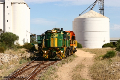 060109 2122
Kyancutta, ASR 830 class unit 842, an AE Goodwin built ALCo DL531 model loco serial 84140 leads EMD unit 1204 due to air-conditioning trouble and sister ALCo 851 as they shunt empty grain waggons on the silo loop. 9th January 2006.
Keywords: 830-class;842;AE-Goodwin;ALCo;DL531;84140;
