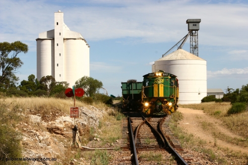 060109 2125
Kyancutta, ASR 830 class unit 842, an AE Goodwin built ALCo DL531 model loco serial 84140 leads EMD unit 1204 due to air-conditioning trouble and sister ALCo 851 as they shunt empty grain waggons on the silo loop. 9th January 2006.
Keywords: 830-class;842;AE-Goodwin;ALCo;DL531;84140;