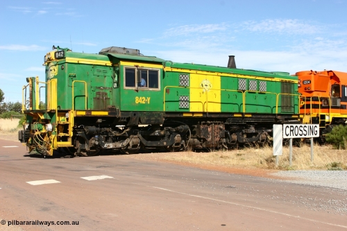 060109 2129
Kyancutta, ASR 830 class unit 842, an AE Goodwin built ALCo DL531 model loco serial 84140 leads EMD unit 1204 due to air-conditioning trouble and sister ALCo 851 as they shunt across Museum Terrace to re-join the train on the mainline. 9th January 2006.
Keywords: 830-class;842;AE-Goodwin;ALCo;DL531;84140;