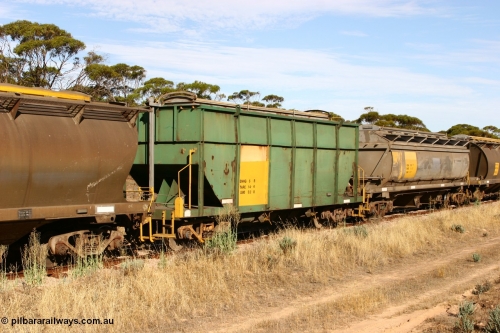 060109 2148
Wannamana, former Australian National narrow gauge ENHG type bogie grain waggon ENHG 6, originally built by Moore Road Ind, Victoria as NB type NB 1444 ballast hopper for the NAR, then to standard gauge in 1975 as BA type BA 1536, to EP July 1984, recoded to ENHT type ENHT 11 in 1985 and further rebuilt forming one half of ENHG type grain waggon in August 1986. The conversion involved splicing 2 AHTY-ENHT type waggons together at Port Lincoln workshops, with an HCN type HCN 36 behind it, part of an empty train [url=https://goo.gl/maps/43EOs]on the curve[/url]. 9th January 2006.
Keywords: ENHG-type;ENHG6;Moore-Road-Ind-Victoria;NB-type;NB1444;BA-type;BA1536;ENHT-type;ENHT11;