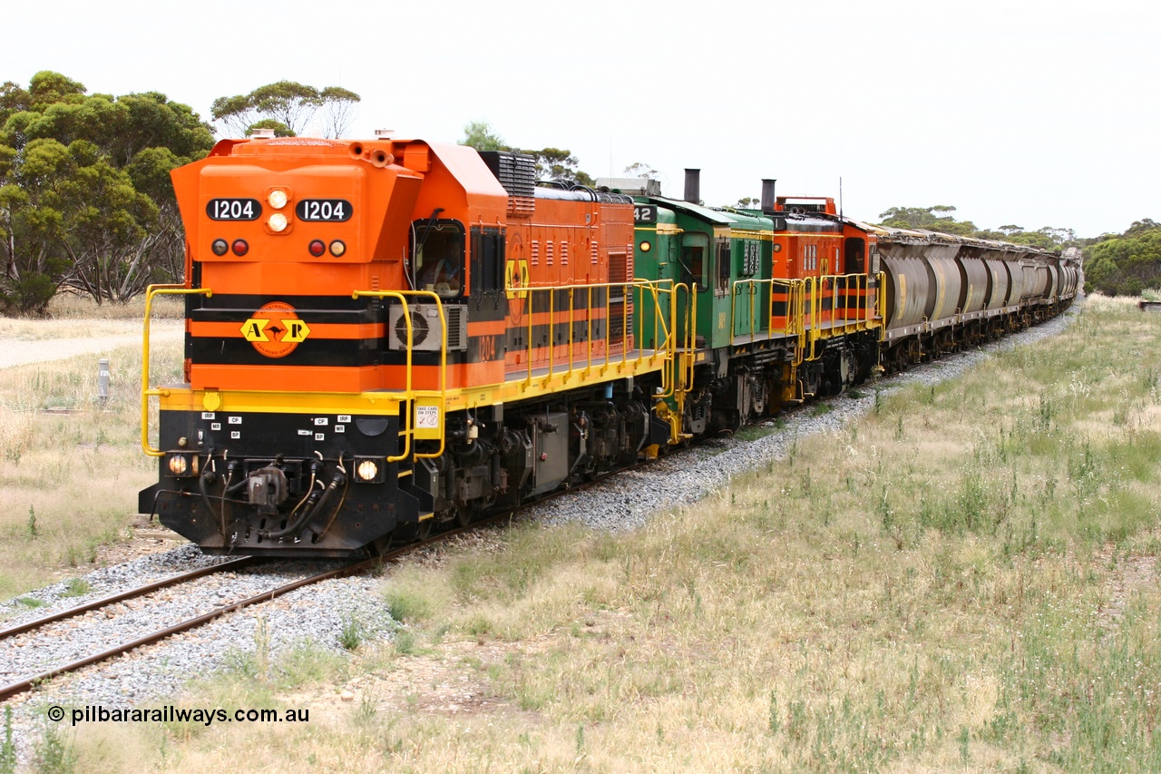 060110 2234
Karkoo, empty grain train behind ARG 1200 class unit 1204, a Clyde Engineering EMD model G12C serial 65-428, originally built for the WAGR as the final unit of fourteen A class locomotives in 1965 and sent to the Eyre Peninsula in July 2004 and two 830 class AE Goodwin built ALCo model DL531 units 842 serial 84140 ex SAR broad gauge and to Eyre Peninsula in October 1987, and 851 serial 84137 new to Eyre Peninsula in 1962. [url=https://goo.gl/maps/syz89ziXmoL2]Approx. location of image[/url].
Keywords: 1200-class;1204;Clyde-Engineering-Granville-NSW;EMD;G12C;65-428;A-class;A1514;830-class;842;851;AE-Goodwin;ALCo;DL531;84137;84140;