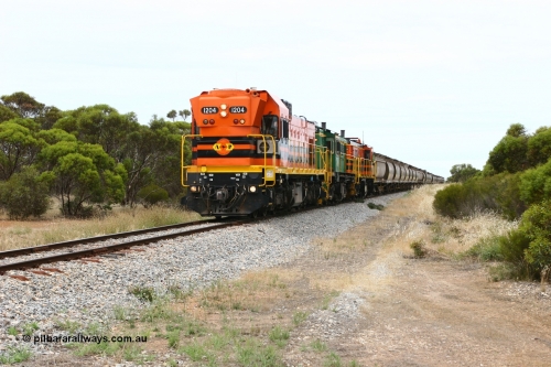 060110 2152
Pillana, former station site, 59 km, empty grain train behind ARG 1200 class unit 1204, a Clyde Engineering EMD model G12C serial 65-428, originally built for the WAGR as the final unit of fourteen A class locomotives in 1965 then sent to the Eyre Peninsula in July 2004, and two 830 class AE Goodwin built ALCo model DL531 units 842 serial 84140 ex SAR broad gauge to Eyre Peninsula in October 1987, and 851 serial 84137 new to Eyre Peninsula in 1962. [url=https://goo.gl/maps/BcnmpGwGqtw]Approx. location of photo[/url].
Keywords: 1200-class;1204;Clyde-Engineering-Granville-NSW;EMD;G12C;65-428;A-class;A1514;830-class;842;851;AE-Goodwin;ALCo;DL531;84137;84140;