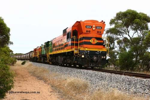 060110 2159
Near the 64 km between Pillana and Cummins, empty grain train behind ARG 1200 class unit 1204, a Clyde Engineering EMD model G12C serial 65-428, originally built for the WAGR as the final unit of fourteen A class locomotives in 1965 then sent to the Eyre Peninsula in July 2004, and two 830 class AE Goodwin built ALCo model DL531 units 842 serial 84140 ex SAR broad gauge to Eyre Peninsula in October 1987, and 851 serial 84137 new to Eyre Peninsula in 1962. [url=https://goo.gl/maps/NECDZnDkLfv]Approx. location of photo[/url].
Keywords: 1200-class;1204;Clyde-Engineering-Granville-NSW;EMD;G12C;65-428;A-class;A1514;830-class;842;851;AE-Goodwin;ALCo;DL531;84137;84140;