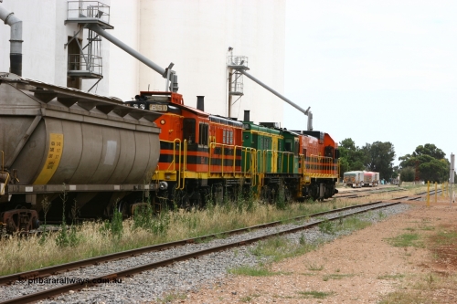 060110 2170
Cummins, trailing view of empty grain train running down the yard along the Penong mainline behind ARG 1200 class unit 1204, a Clyde Engineering EMD model G12C serial 65-428, originally built for the WAGR as the final unit of fourteen A class locomotives in 1965 and sent to the Eyre Peninsula in July 2004 and two 830 class AE Goodwin built ALCo model DL531 units 842 serial 84140 ex SAR broad gauge to Eyre Peninsula in October 1987, and 851 serial 84137 new to Eyre Peninsula in 1962. [url=https://goo.gl/maps/q5aVqSmjCP62]Approx. location of image[/url].
Keywords: 1200-class;1204;Clyde-Engineering-Granville-NSW;EMD;G12C;65-428;A-class;A1514;830-class;842;851;AE-Goodwin;ALCo;DL531;84137;84140;