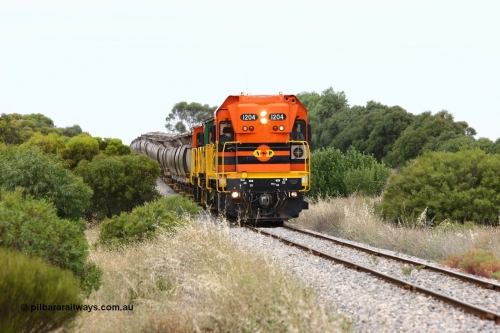 060110 2176
Near the 73 km and Cockaleechie Road grade crossing, empty grain train with ARG 1200 class unit 1204, a Clyde Engineering EMD model G12C serial 65-428, originally built for the WAGR as the final unit of fourteen A class locomotives in 1965 and sent to the Eyre Peninsula in July 2004 and two 830 class AE Goodwin built ALCo model DL531 units 842 serial 84140 ex SAR broad gauge to Eyre Peninsula in October 1987, and 851 serial 84137 new to Eyre Peninsula in 1962. [url=https://goo.gl/maps/LoznGHgHTUC2]Approx. location of image[/url].
Keywords: 1200-class;1204;Clyde-Engineering-Granville-NSW;EMD;G12C;65-428;A-class;A1514;830-class;842;851;AE-Goodwin;ALCo;DL531;84137;84140;