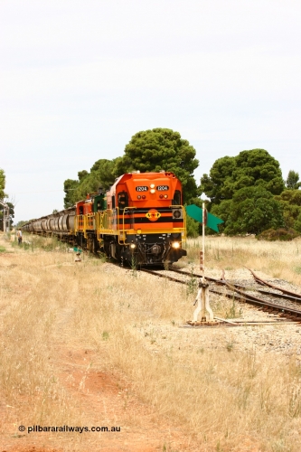 060110 2193
Yeelanna, the second person watches ARG 1200 class unit 1204, a Clyde Engineering EMD model G12C serial 65-428, originally built for the WAGR as the final unit of fourteen A class locomotives in 1965 and sent to the Eyre Peninsula in July 2004 as it shunts forward to cut out the empty cars for the siding. [url=https://goo.gl/maps/1JetzWBTGAw]Approx. location of image[/url].
Keywords: 1200-class;1204;Clyde-Engineering-Granville-NSW;EMD;G12C;65-428;A-class;A1514;