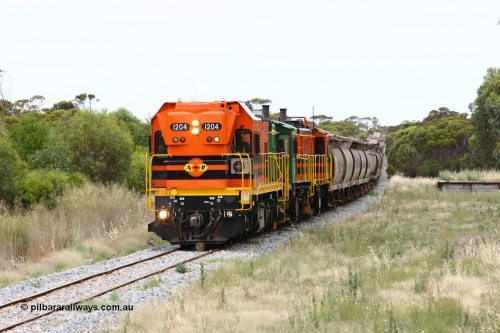 060110 2229
Karkoo, empty grain train behind ARG 1200 class unit 1204, a Clyde Engineering EMD model G12C serial 65-428, originally built for the WAGR as the final unit of fourteen A class locomotives in 1965 and sent to the Eyre Peninsula in July 2004 and two 830 class AE Goodwin built ALCo model DL531 units 842 serial 84140 ex SAR broad gauge and to Eyre Peninsula in October 1987, and 851 serial 84137 new to Eyre Peninsula in 1962. [url=https://goo.gl/maps/syz89ziXmoL2]Approx. location of image[/url].
Keywords: 1200-class;1204;Clyde-Engineering-Granville-NSW;EMD;G12C;65-428;A-class;A1514;