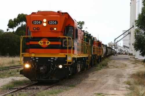 060110 2236
Lock, grain train loading underway behind ARG 1200 class unit 1204, a Clyde Engineering EMD model G12C serial 65-428, originally built for the WAGR as the final unit of fourteen A class locomotives in 1965 and sent to the Eyre Peninsula in July 2004 and two 830 class AE Goodwin built ALCo model DL531 units 842 serial 84140 ex SAR broad gauge and to Eyre Peninsula in October 1987, and 851 serial 84137 new to Eyre Peninsula in 1962. [url=https://goo.gl/maps/epTNTP7PARy]Approx. location of image[/url].
Keywords: 1200-class;1204;Clyde-Engineering-Granville-NSW;EMD;G12C;65-428;A-class;A1514;