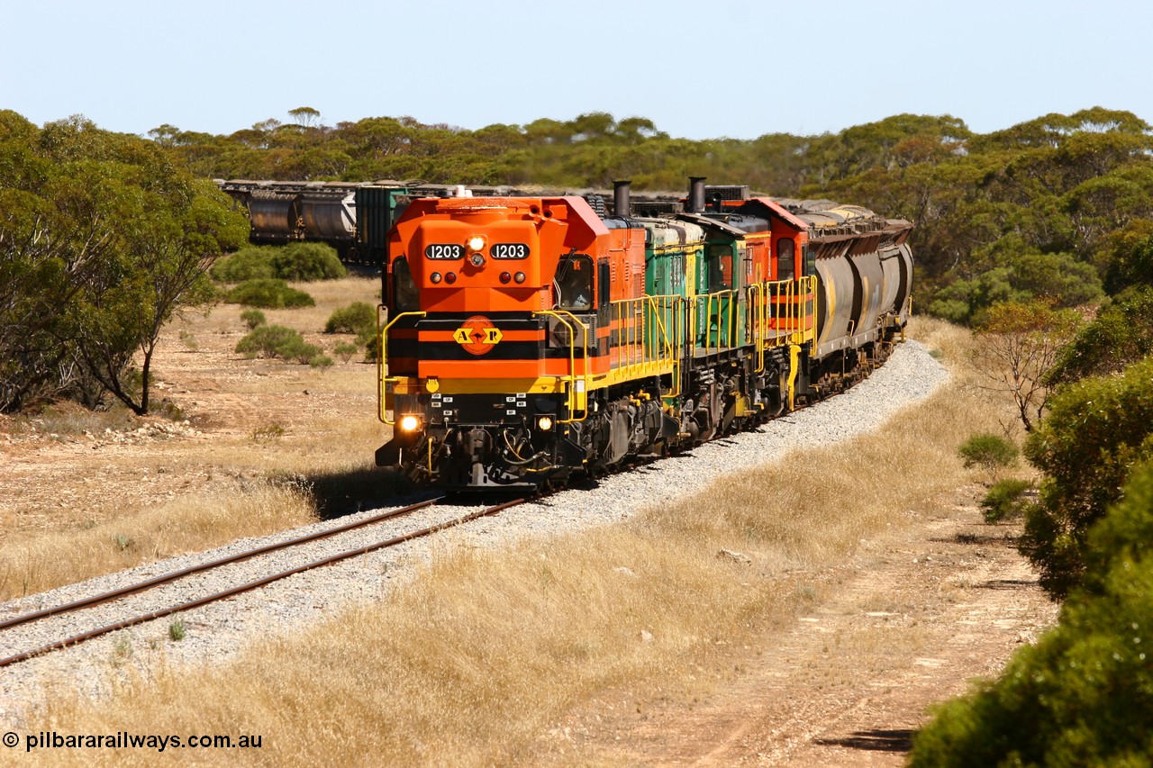 060111 2314
Nantuma, Clyde Engineering built EMD G12C model loco 1203 serial 65-427 leads two ALCo units 850 and 905 as they round the bend just north of the old station site at the 183 km. Their next shunt will be Warramboo. 11th January 2006.
Keywords: 1200-class;1203;Clyde-Engineering-Granville-NSW;EMD;G12C;65-427;A-class;A1513;