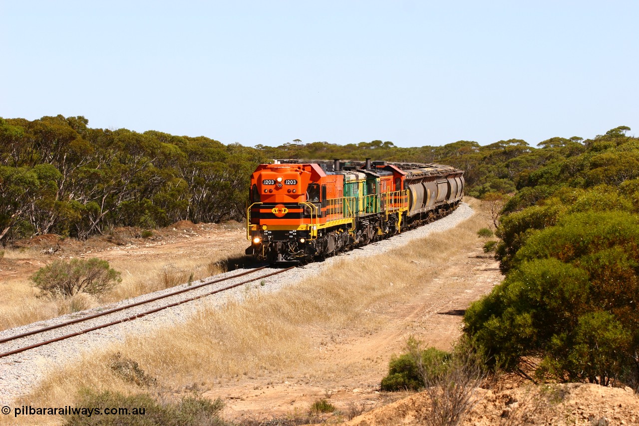 060111 2315
Nantuma, Clyde Engineering built EMD G12C model loco 1203 serial 65-427 leads two ALCo units 850 and 905 as they round the bend just north of the old station site at the 183 km. Their next shunt will be Warramboo. 11th January 2006.
Keywords: 1200-class;1203;Clyde-Engineering-Granville-NSW;EMD;G12C;65-427;A-class;A1513;