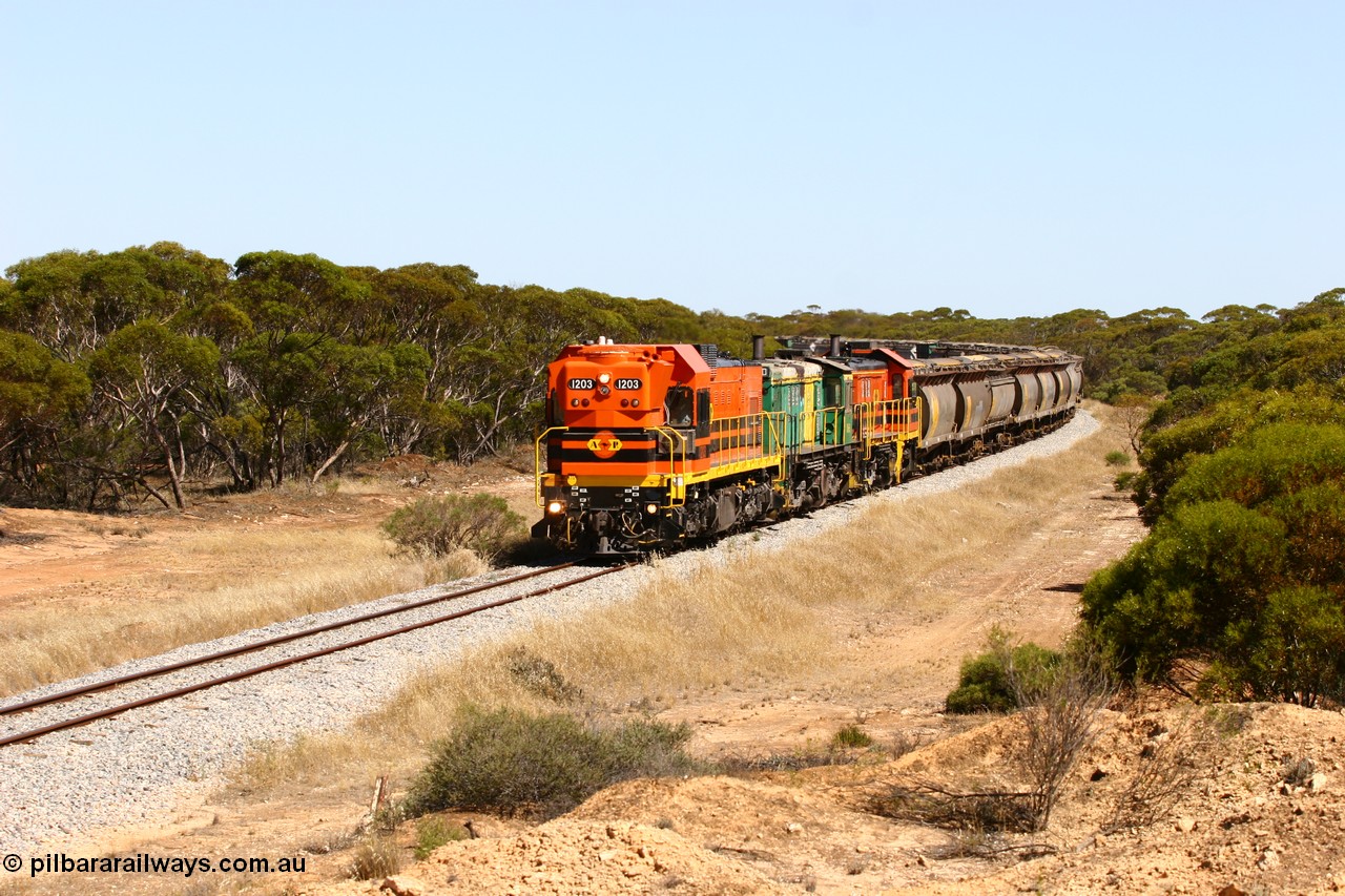 060111 2316
Nantuma, Clyde Engineering built EMD G12C model loco 1203 serial 65-427 leads two ALCo units 850 and 905 as they round the bend just north of the old station site at the 183 km. Their next shunt will be Warramboo. 11th January 2006.
Keywords: 1200-class;1203;Clyde-Engineering-Granville-NSW;EMD;G12C;65-427;A-class;A1513;