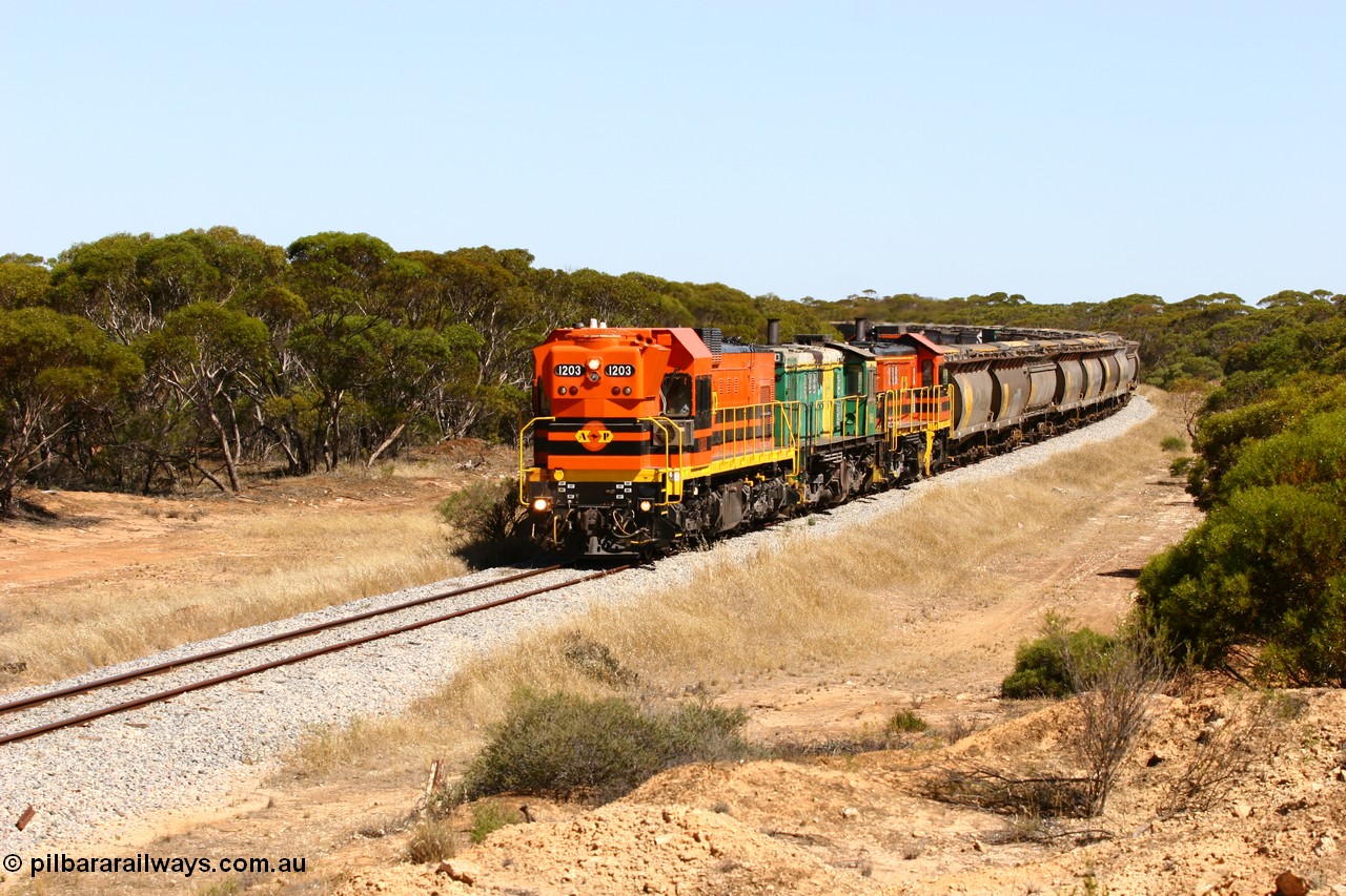 060111 2317
Nantuma, Clyde Engineering built EMD G12C model loco 1203 serial 65-427 leads two ALCo units 850 and 905 as they round the bend just north of the old station site at the 183 km. Their next shunt will be Warramboo. 11th January 2006.
Keywords: 1200-class;1203;Clyde-Engineering-Granville-NSW;EMD;G12C;65-427;A-class;A1513;