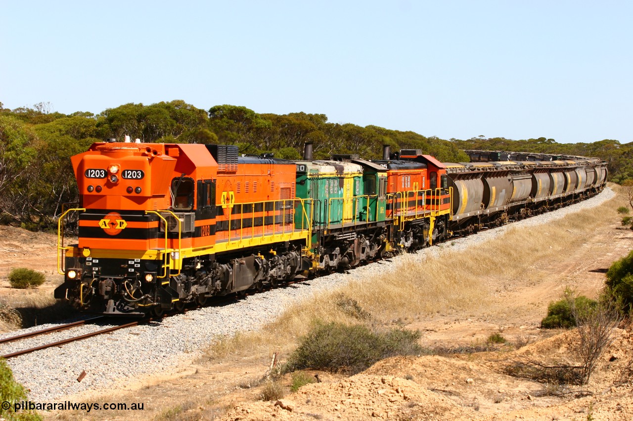 060111 2321
Nantuma, Clyde Engineering built EMD G12C model loco 1203 serial 65-427 leads two ALCo units 850 and 905 as they round the bend just north of the old station site at the 183 km. Their next shunt will be Warramboo. 11th January 2006.
Keywords: 1200-class;1203;Clyde-Engineering-Granville-NSW;EMD;G12C;65-427;A-class;A1513;