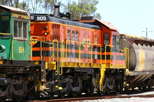 060111 2263
Tooligie, at the Tooligie Road grade crossing, ARG 900 class unit 905, originally built by AE Goodwin as 830 class unit 836 serial 83727, converted to DA class DA 6 by Australian National at Port Augusta workshops for driver only operation in 1996. Trailing unit in a north bound grain train. 11th January 2006.
Keywords: 900-class;905;AE-Goodwin;ALCo;DL531;83727;830-class;836;DA-class;DA6;
