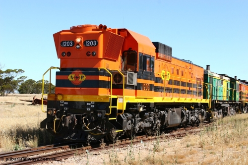 060111 2327
Warramboo, ARG 1200 class unit 1203, a Clyde Engineering EMD model G12C serial 65-427, one of fourteen originally built between 1960-65 for WAGR as their A class A 1513, fitted with dynamic brakes and financed by Western Mining Corporation, started working on the Eyre Peninsula in November 2004, here shunting back along the mainline to resume the journey north. 11th January 2006.
Keywords: 1200-class;1203;Clyde-Engineering-Granville-NSW;EMD;G12C;65-427;A-class;A1513;