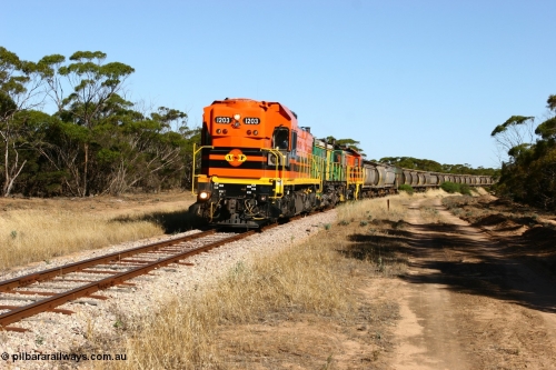 060111 2392
Wannamana, ARG 1200 class unit 1203, a Clyde Engineering EMD model G12C serial 65-427, one of fourteen originally built between 1960-65 for WAGR as their A class A 1513, fitted with dynamic brakes and financed by Western Mining Corporation, started working on the Eyre Peninsula in November 2004 here leading a north bound empty grain train heading to Wudinna. Wannamana was located at the 210 km and opened in January 1927, this scene is some 79 years later. The siding was closed in April 1957. 11th January 2006.
Keywords: 1200-class;1203;Clyde-Engineering-Granville-NSW;EMD;G12C;65-427;A-class;A1513;