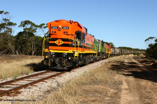 060111 2394
Wannamana, ARG 1200 class unit 1203, a Clyde Engineering EMD model G12C serial 65-427, one of fourteen originally built between 1960-65 for WAGR as their A class A 1513, fitted with dynamic brakes and financed by Western Mining Corporation, started working on the Eyre Peninsula in November 2004 here leading a north bound empty grain train heading to Wudinna. Wannamana was located at the 210 km and opened in January 1927, this scene is some 79 years later. The siding was closed in April 1957. 11th January 2006.
Keywords: 1200-class;1203;Clyde-Engineering-Granville-NSW;EMD;G12C;65-427;A-class;A1513;