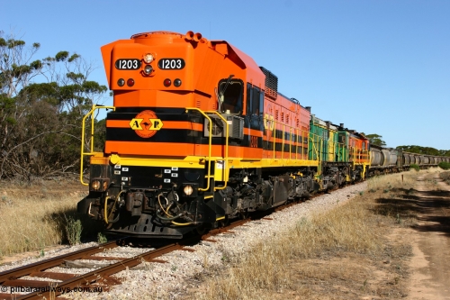 060111 2396
Wannamana, ARG 1200 class unit 1203, a Clyde Engineering EMD model G12C serial 65-427, one of fourteen originally built between 1960-65 for WAGR as their A class A 1513, fitted with dynamic brakes and financed by Western Mining Corporation, started working on the Eyre Peninsula in November 2004 here leading a north bound empty grain train heading to Wudinna. Wannamana was located at the 210 km and opened in January 1927, this scene is some 79 years later. The siding was closed in April 1957. 11th January 2006.
Keywords: 1200-class;1203;Clyde-Engineering-Granville-NSW;EMD;G12C;65-427;A-class;A1513;