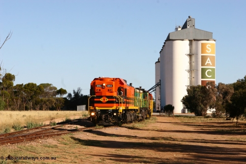060111 2402
Wudinna, ARG 1200 class unit 1203, a Clyde Engineering EMD model G12C serial 65-427, one of fourteen originally built between 1960-65 for WAGR as their A class A 1513, fitted with dynamic brakes and financed by Western Mining Corporation, started working on the Eyre Peninsula in November 2004, shunts through the yard.
Keywords: 1200-class;1203;Clyde-Engineering-Granville-NSW;EMD;G12C;65-427;A-class;A1513;