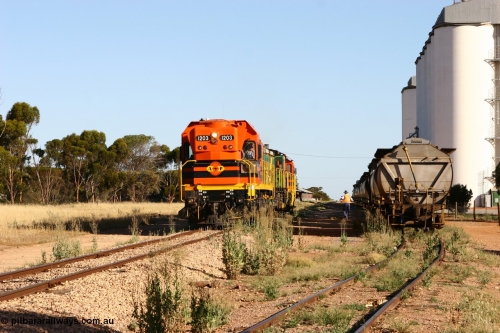 060111 2413
Wudinna, ARG 1200 class unit 1203, a Clyde Engineering EMD model G12C serial 65-427, one of fourteen originally built between 1960-65 for WAGR as their A class A 1513, fitted with dynamic brakes and financed by Western Mining Corporation, started working on the Eyre Peninsula in November 2004, 1203 and two ALCo units 850 and 905 shunt back down the mainline at Wudinna as they run round their consist. 11th January 2006.
Keywords: 1200-class;1203;Clyde-Engineering-Granville-NSW;EMD;G12C;65-427;A-class;A1513;