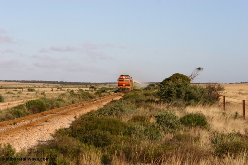 060113 2414
Ceduna, loaded gypsum train 6DD2 powers along the grades outside of town behind the triple 1600 / NJ class combination of 1604, NJ 3 and 1601 at 08:10 AM on the Friday the January 13, 2006.
Keywords: 1600-class;1604;Clyde-Engineering-Granville-NSW;EMD;JL22C;71-731;NJ-class;NJ4;