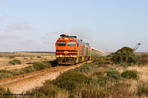 060113 2416
Ceduna, loaded gypsum train 6DD2 powers along the grades outside of town behind the triple 1600 / NJ class combination of 1604, NJ 3 and 1601 at 08:10 AM on the Friday the 13th January 2006.
Keywords: 1600-class;1604;Clyde-Engineering-Granville-NSW;EMD;JL22C;71-731;NJ-class;NJ4;