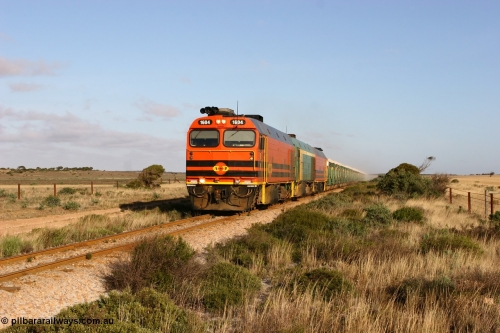 060113 2418
Ceduna, loaded gypsum train 6DD2 stirs up the dust behind the triple Clyde Engineering EMD JL22C model 1600 / NJ class combination of 1604 serial 71-731 and originally NJ 4, NJ 3 serial 71-730 and 1601 serial 71-728 class leader NJ 1, all three units started on the Central Australia Railway in 1971 and were transferred to the Eyre Peninsula in 1981. 08:10 AM on the Friday the 13th January 2006.
Keywords: 1600-class;1604;Clyde-Engineering-Granville-NSW;EMD;JL22C;71-731;NJ-class;NJ4;