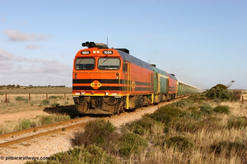 060113 2420
Ceduna, loaded gypsum train 6DD2 stirs up the dust behind the triple Clyde Engineering EMD JL22C model 1600 / NJ class combination of 1604 serial 71-731 and originally NJ 4, NJ 3 serial 71-730 and 1601 serial 71-728 class leader NJ 1, all three units started on the Central Australia Railway in 1971 and were transferred to the Eyre Peninsula in 1981. 08:10 AM on the Friday the 13th January 2006.
Keywords: 1600-class;1604;Clyde-Engineering-Granville-NSW;EMD;JL22C;71-731;NJ-class;NJ4;