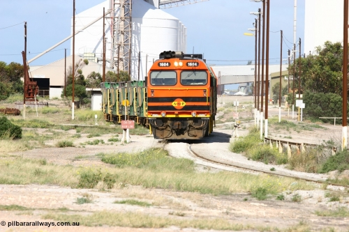060113 2465
Thevenard, narrow gauge loco 1604 departs the yard with empty train 6DD3, 1604 leads a triple consist of Clyde Engineering built EMD JL22C model 1600 / NJ class combination of 1604 serial 71-731 and originally NJ 4, NJ 3 serial 71-730 and 1601 serial 71-728 the original class leader NJ 1, all three units started on the Central Australia Railway in 1971 and were transferred to the Eyre Peninsula in 1981. 1604 and 1601 both renumbered in 2004. 13th January 2006.
Keywords: 1600-class;1604;Clyde-Engineering-Granville-NSW;EMD;JL22C;71-731;NJ-class;NJ4;