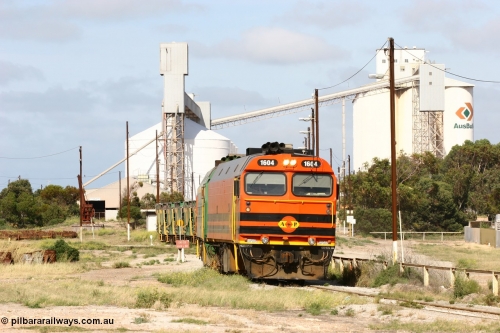 060113 2467
Thevenard, narrow gauge loco 1604 departs the yard with empty train 6DD3, 1604 leads a triple consist of Clyde Engineering built EMD JL22C model 1600 / NJ class combination of 1604 serial 71-731 and originally NJ 4, NJ 3 serial 71-730 and 1601 serial 71-728 the original class leader NJ 1, all three units started on the Central Australia Railway in 1971 and were transferred to the Eyre Peninsula in 1981. 1604 and 1601 both renumbered in 2004. 13th January 2006.
Keywords: 1600-class;1604;Clyde-Engineering-Granville-NSW;EMD;JL22C;71-731;NJ-class;NJ4;
