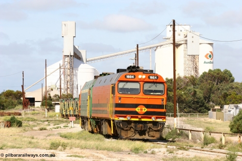 060113 2468
Thevenard, narrow gauge loco 1604 departs the yard with empty train 6DD3, 1604 leads a triple consist of Clyde Engineering built EMD JL22C model 1600 / NJ class combination of 1604 serial 71-731 and originally NJ 4, NJ 3 serial 71-730 and 1601 serial 71-728 the original class leader NJ 1, all three units started on the Central Australia Railway in 1971 and were transferred to the Eyre Peninsula in 1981. 1604 and 1601 both renumbered in 2004. 13th January 2006.
Keywords: 1600-class;1604;Clyde-Engineering-Granville-NSW;EMD;JL22C;71-731;NJ-class;NJ4;