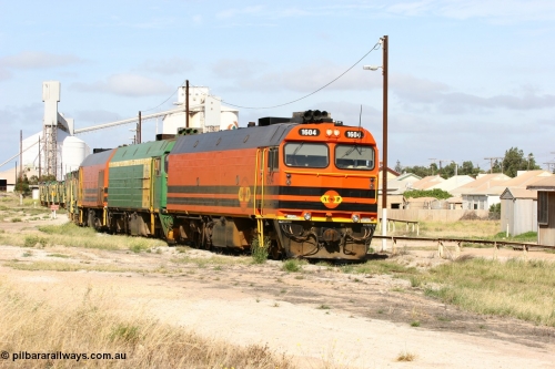060113 2472
Thevenard, narrow gauge loco 1604 departs the yard with empty train 6DD3, 1604 leads a triple consist of Clyde Engineering built EMD JL22C model 1600 / NJ class combination of 1604 serial 71-731 and originally NJ 4, NJ 3 serial 71-730 and 1601 serial 71-728 the original class leader NJ 1, all three units started on the Central Australia Railway in 1971 and were transferred to the Eyre Peninsula in 1981. 1604 and 1601 both renumbered in 2004. 13th January 2006.
Keywords: 1600-class;1604;Clyde-Engineering-Granville-NSW;EMD;JL22C;71-731;NJ-class;NJ4;