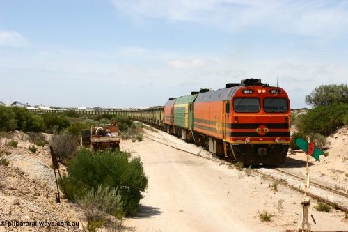 060113 2488
Kevin, ARG 1600 class narrow gauge loco 1604 a Clyde Engineering built EMD model JL22C serial 71-731, originally built for the Central Australia Railway in 1971, transferred to the Eyre Peninsula in 1981 arrives with empty gypsum train 6DD3. January 13, 2006.
Keywords: 1600-class;1604;Clyde-Engineering-Granville-NSW;EMD;JL22C;71-731;NJ-class;NJ4;