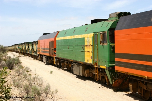 060113 2499
Kevin, empty train 6DD3 on the [url=https://goo.gl/maps/jZAuZ]stub of the now closed line to Penong[/url] shunts back onto the triangle leg to reverse the train prior to loading. January 13, 2006.
Keywords: NJ-class;NJ3;Clyde-Engineering-Granville-NSW;EMD;JL22C;71-730;