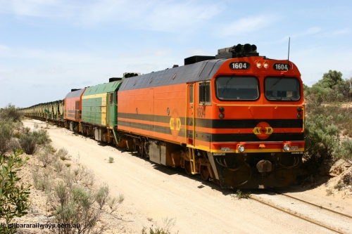 060113 2500
Kevin, empty train 6DD3 on the [url=https://goo.gl/maps/jZAuZ]stub of the now closed line to Penong[/url] shunts back onto the triangle leg to reverse the train prior to loading. January 13, 2006.
Keywords: 1600-class;1604;Clyde-Engineering-Granville-NSW;EMD;JL22C;71-731;NJ-class;NJ4;