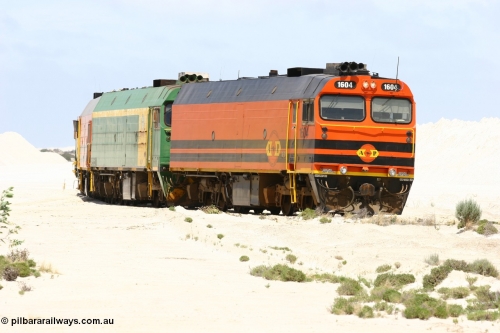 060113 2512
Kevin, empty train 6DD3 shunts back onto the triangle leg behind triple NJ/1600 class units, Clyde Engineering built EMD JL22C models, originally coded the NJ class and built for the Central Australia Railway in 1971, transferred to the Eyre Peninsula in 1981 and recoded to the 1600 class. January 13, 2006.
Keywords: 1600-class;1604;Clyde-Engineering-Granville-NSW;EMD;JL22C;71-731;NJ-class;NJ4;