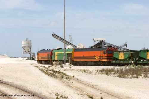 060113 2529
Kevin, empty train 6DD3 is heading onto the south leg with some of the gypsum plant behind the train and a set of original loading bins gypsum loading siding to continue the reversing process. January 13, 2006.
Keywords: 1600-class;1601;Clyde-Engineering-Granville-NSW;EMD;JL22C;71-728;NJ-class;NJ1;