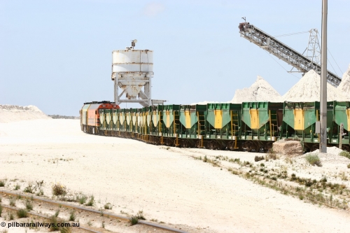 060113 2534
Kevin, empty train 6DD3 is heading onto the south leg with some of the gypsum plant behind the train and a set of original loading bins gypsum loading siding to continue the reversing process. January 13, 2006.
