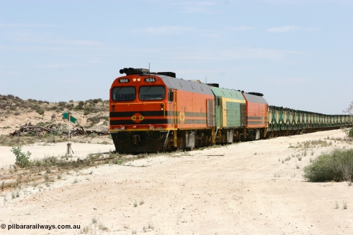 060113 2542
Kevin, with the points now set again for the mainline narrow gauge locos 1604, NJ 3 and 1601 sit on the mainline to Penong, having reversed train 6DD3 on the Kevin triangle 1600 class unit 1604 in Australian Railroad Group livery a Clyde Engineering built EMD JL22C model serial 71-731, originally built as NJ class NJ 4 and built for the Central Australia Railway in 1971, transferred to the Eyre Peninsula in 1981. 13th January 2006.
Keywords: 1600-class;1604;Clyde-Engineering-Granville-NSW;EMD;JL22C;71-731;NJ-class;NJ4;