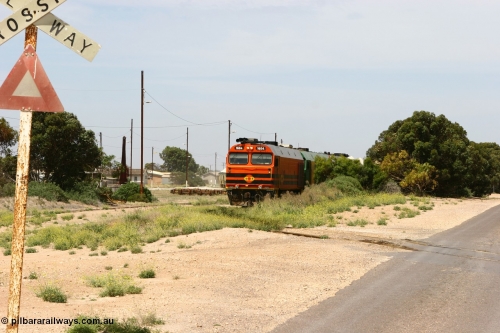 060113 2559
Thevenard, loaded gypsum train 6DD4 snakes into the yard behind 1600 class unit 1604 in Australian Railroad Group livery a Clyde Engineering built EMD JL22C model serial 71-731, originally built as NJ class NJ 4. [url=https://goo.gl/maps/9g3QoE4iaiDjqyta9]Bergmann Dr grade crossing[/url]. 13th January 2006.
Keywords: 1600-class;1604;Clyde-Engineering-Granville-NSW;EMD;JL22C;71-731;NJ-class;NJ4;