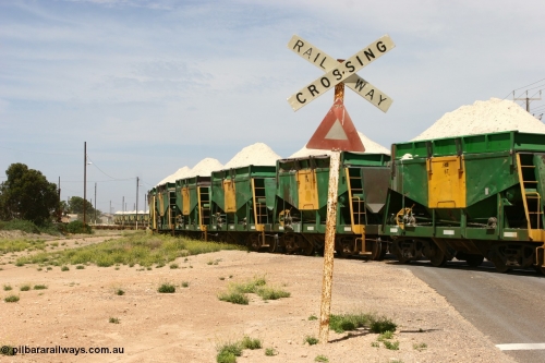 060113 2567
Thevenard, the string of ENH and ENHA waggons loaded high with gypsum on train 6DD4 as the snake through the yard destined for the unloader. [url=https://goo.gl/maps/9g3QoE4iaiDjqyta9]Bergmann Dr grade crossing[/url]. 13th January 2006.
Keywords: ENH-type;ENH6;Kinki-Sharyo-Japan;NH-type;NH906;