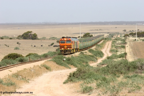 060113 2576
Ceduna, or Denial Bay area, empty gypsum train 6DD5 blasts up hill at the 440 km, west of Carpenter Corner Rd with power from triple 1600/NJ class units 1604, NJ 3 and 1601. 1604 in Australian Railroad Group livery is a Clyde Engineering built EMD JL22C model serial 71-731, originally built as NJ class NJ 4. [url=https://goo.gl/maps/ULA2PjjKh6nhwHTdA]Location approximation[/url]. 13th January 2006.
Keywords: 1600-class;1604;Clyde-Engineering-Granville-NSW;EMD;JL22C;71-731;NJ-class;NJ4;