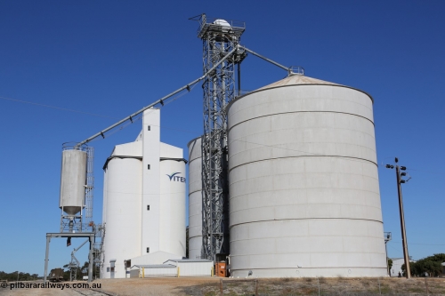 130703 0185
Tooligie, over view of the grain complex, Ascom Jumbo silo complex with over rail loading hopper and a four cell concrete silo complex beside it. [url=https://goo.gl/maps/1D5uHK61SpN4ikow9]Geo location[/url]. 3rd July 2013.
