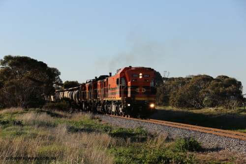 130703 0249
Kaldow, running south with the sun behind it is 1200 class 1204 a Clyde Engineering built EMD G12C model with serial 65-428 leading two ALCo units and was originally built in 1965 for Western Mining Corporation and operated by the WAGR as their A class A 1513. It came to the Eyre Peninsula in October 2004. [url=https://goo.gl/maps/FnDpXh45LbN7scrt5]Geo location[/url]. 3rd July 2013.
Keywords: 1200-class;1203;Clyde-Engineering-Granville-NSW;EMD;G12C;65-427;A-class;A1513;