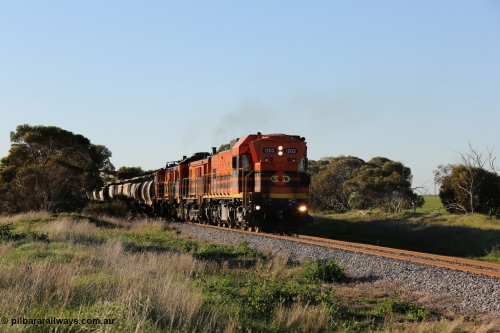 130703 0250
Kaldow, running south with the sun behind it is 1200 class 1204 a Clyde Engineering built EMD G12C model with serial 65-428 leading two ALCo units and was originally built in 1965 for Western Mining Corporation and operated by the WAGR as their A class A 1513. It came to the Eyre Peninsula in October 2004. [url=https://goo.gl/maps/FnDpXh45LbN7scrt5]Geo location[/url]. 3rd July 2013.
Keywords: 1200-class;1203;Clyde-Engineering-Granville-NSW;EMD;G12C;65-427;A-class;A1513;