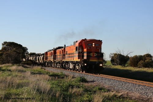 130703 0253
Kaldow, running south with the sun behind it is 1200 class 1204 a Clyde Engineering built EMD G12C model with serial 65-428 leading two ALCo units and was originally built in 1965 for Western Mining Corporation and operated by the WAGR as their A class A 1513. It came to the Eyre Peninsula in October 2004. [url=https://goo.gl/maps/FnDpXh45LbN7scrt5]Geo location[/url]. 3rd July 2013.
Keywords: 1200-class;1203;Clyde-Engineering-Granville-NSW;EMD;G12C;65-427;A-class;A1513;