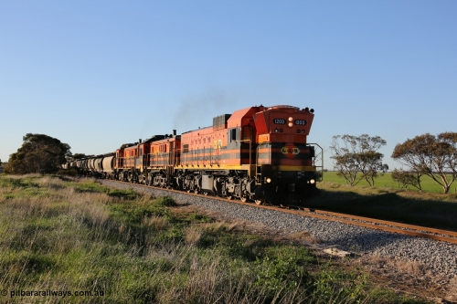 130703 0257
Kaldow, running south with the sun behind it is 1200 class 1204 a Clyde Engineering built EMD G12C model with serial 65-428 leading two ALCo units and was originally built in 1965 for Western Mining Corporation and operated by the WAGR as their A class A 1513. It came to the Eyre Peninsula in October 2004. [url=https://goo.gl/maps/FnDpXh45LbN7scrt5]Geo location[/url]. 3rd July 2013.
Keywords: 1200-class;1203;Clyde-Engineering-Granville-NSW;EMD;G12C;65-427;A-class;A1513;