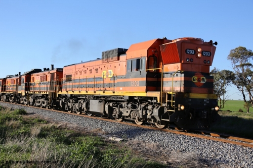 130703 0258
Kaldow, running south with the sun behind it is 1200 class 1204 a Clyde Engineering built EMD G12C model with serial 65-428 leading two ALCo units and was originally built in 1965 for Western Mining Corporation and operated by the WAGR as their A class A 1513. It came to the Eyre Peninsula in October 2004. [url=https://goo.gl/maps/FnDpXh45LbN7scrt5]Geo location[/url]. 3rd July 2013.
Keywords: 1200-class;1203;Clyde-Engineering-Granville-NSW;EMD;G12C;65-427;A-class;A1513;